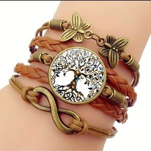 New-Tree of Life Stone with Butterfly Decor and Braid Style Band.